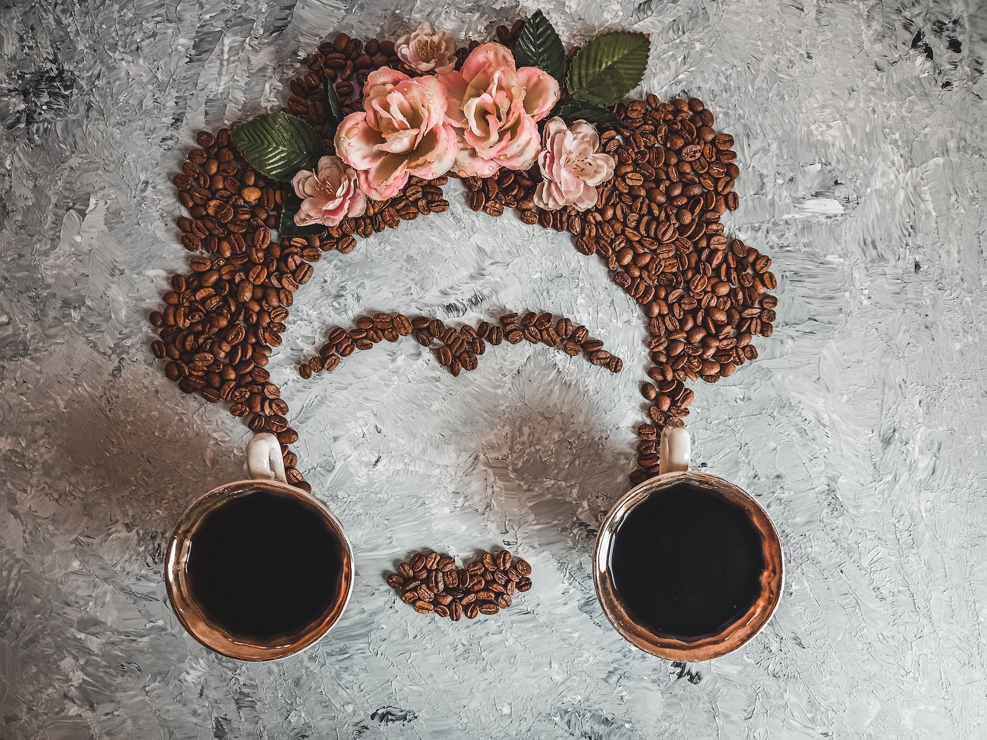 Photo by Işıl Coffee Art with Brown Coffee Beans on Gray Surface - pexels.com